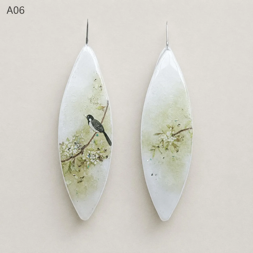 Botanical tatting shuttle design A06, front and back views